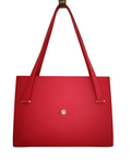Red handbag with gold accents on a white background