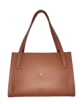 Brown handbag with a visible brand logo on a white background